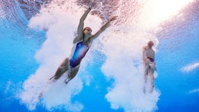 PARIS, FRANCE - JULY 27: (EDITORS NOTE: Image was captured using an underwater robotic camera.) Nais Gillet and Juliette Landi of Team France compete in the Women's Synchronised 3m Springboard Final on day one of the Olympic Games Paris 2024 at Aquatics C