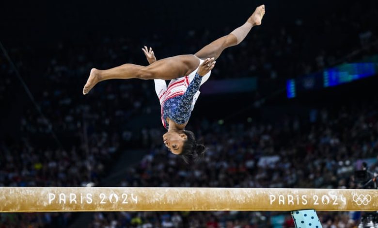 PARIS, FRANCE - JULY 30: Simone Biles of Team United States competes on the balance beam during the Artistic Gymnastics Women's Team Final on day four of the Olympic Games Paris 2024 at the Bercy Arena on July 30, 2024 in Paris, France. (Photo by Tom Well