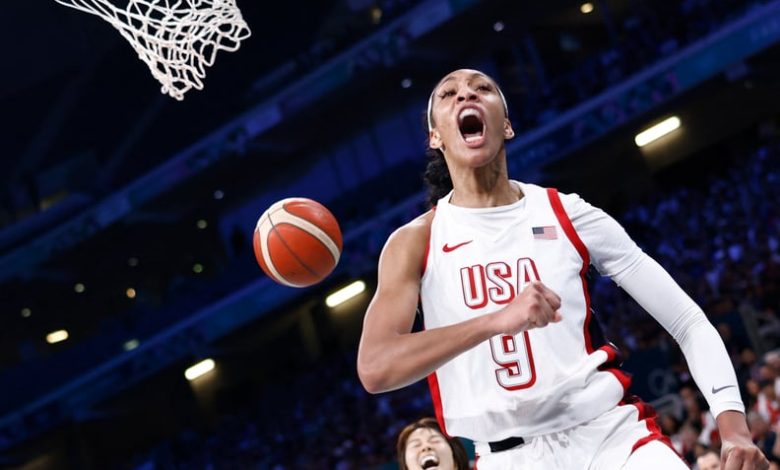 USA's #09 A'ja Wilson celebrates after scoring in the women's preliminary round group C basketball match between USA and Japan during the Paris 2024 Olympic Games at the Pierre-Mauroy stadium in Villeneuve-d'Ascq, northern France, on July 29, 2024. (Photo