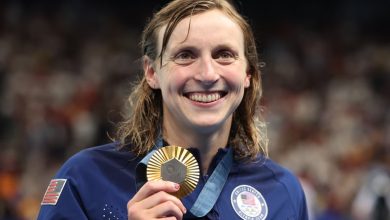 NANTERRE, FRANCE - JULY 31: Katie Ledecky of Team United States poses with her Gold medal from the Women's 1500m Freestyle final on day five of the Olympic Games Paris 2024 at Paris La Defense Arena on July 31, 2024 in Nanterre, France. (Photo by Ian MacN