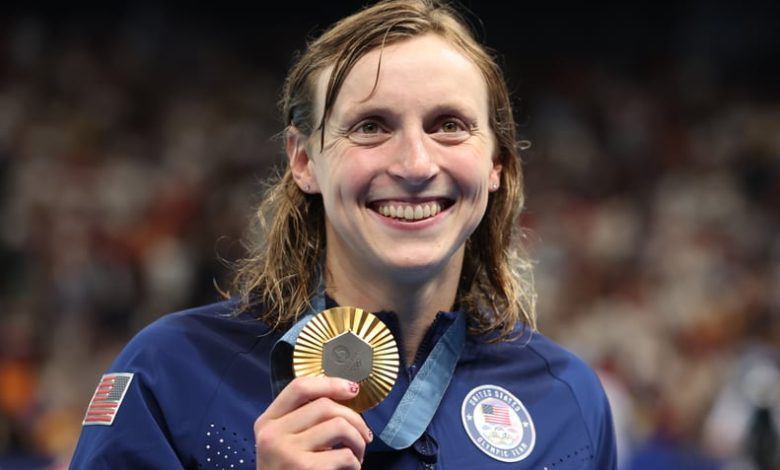 NANTERRE, FRANCE - JULY 31: Katie Ledecky of Team United States poses with her Gold medal from the Women's 1500m Freestyle final on day five of the Olympic Games Paris 2024 at Paris La Defense Arena on July 31, 2024 in Nanterre, France. (Photo by Ian MacN