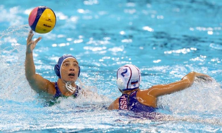 RIO DE JANEIRO, BRAZIL - AUGUST 17:  Roberta Bianconi #8 of Italy passes the ball as Ekaterina Lisunova #2 of Russia defends during the Women's Water Polo at Olympic Aquatics Stadium on August 17, 2016 in Rio de Janeiro, Brazil.  (Photo by Elsa/Getty Imag