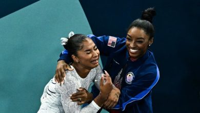 Silver medallist US' Simone Biles (R) and bronze medallist US' Jordan Chiles celebrate at the end of the artistic gymnastics women's floor exercise final during the Paris 2024 Olympic Games at the Bercy Arena in Paris, on August 5, 2024. (Photo by Lionel