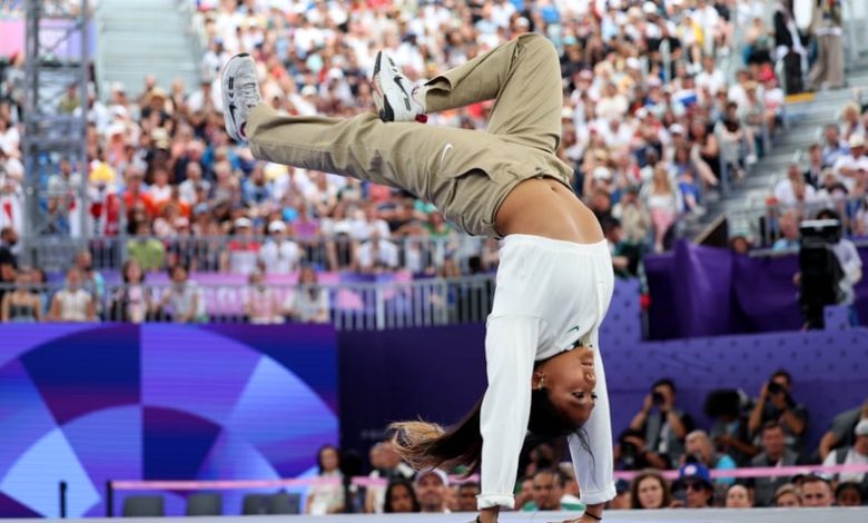 PARIS, FRANCE - AUGUST 09: B-Girl Logistx of Team United States competes during the B-Girls Round Robin - Group B on day fourteen of the Olympic Games Paris 2024 at Place de la Concorde on August 09, 2024 in Paris, France. (Photo by Elsa/Getty Images)