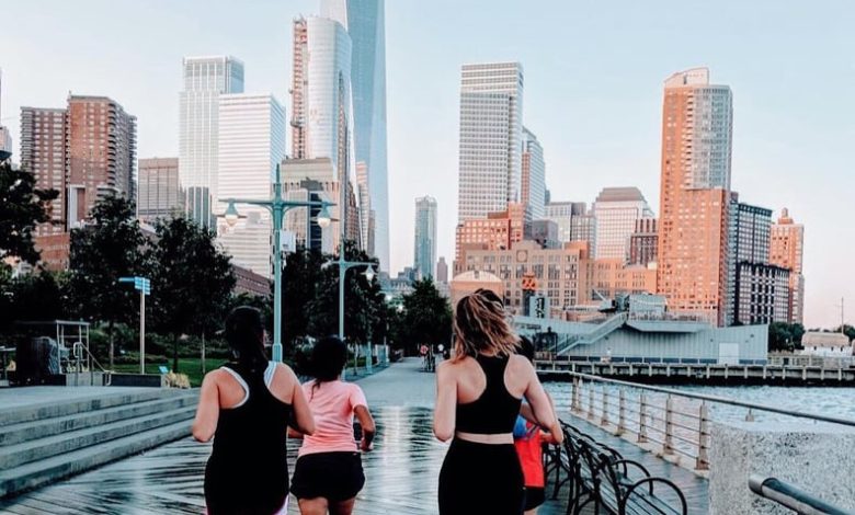 POPSUGAR editor photographed wearing lululemon Swift Speed High-Rise Tights running with group in New York City