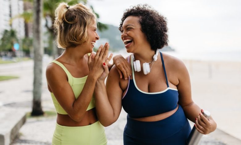 Two happy women in sportswear enjoying the benefits of exercise.