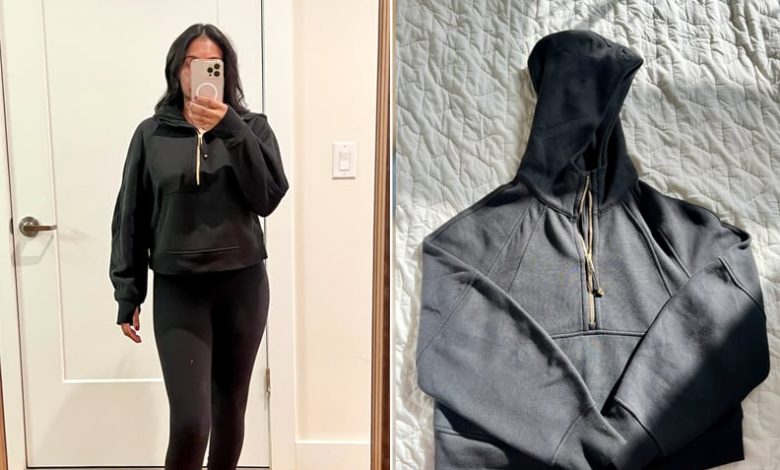 Woman wearing the Lululemon Scuba Oversized Half-Zip Hoodie and the Lululemon Scuba Oversized Half-Zip Hoodie on bed.